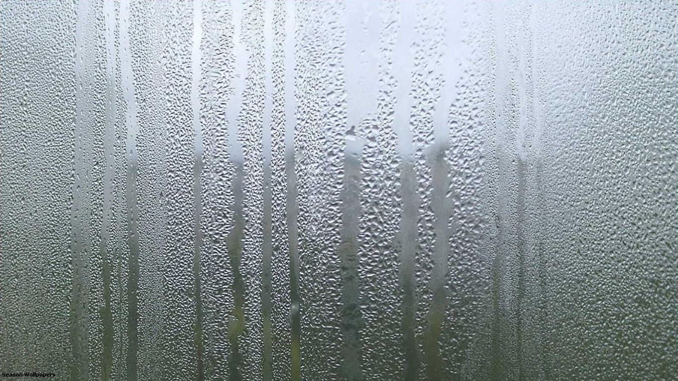 Rain Outside The Window And Drops Of Water Drips On