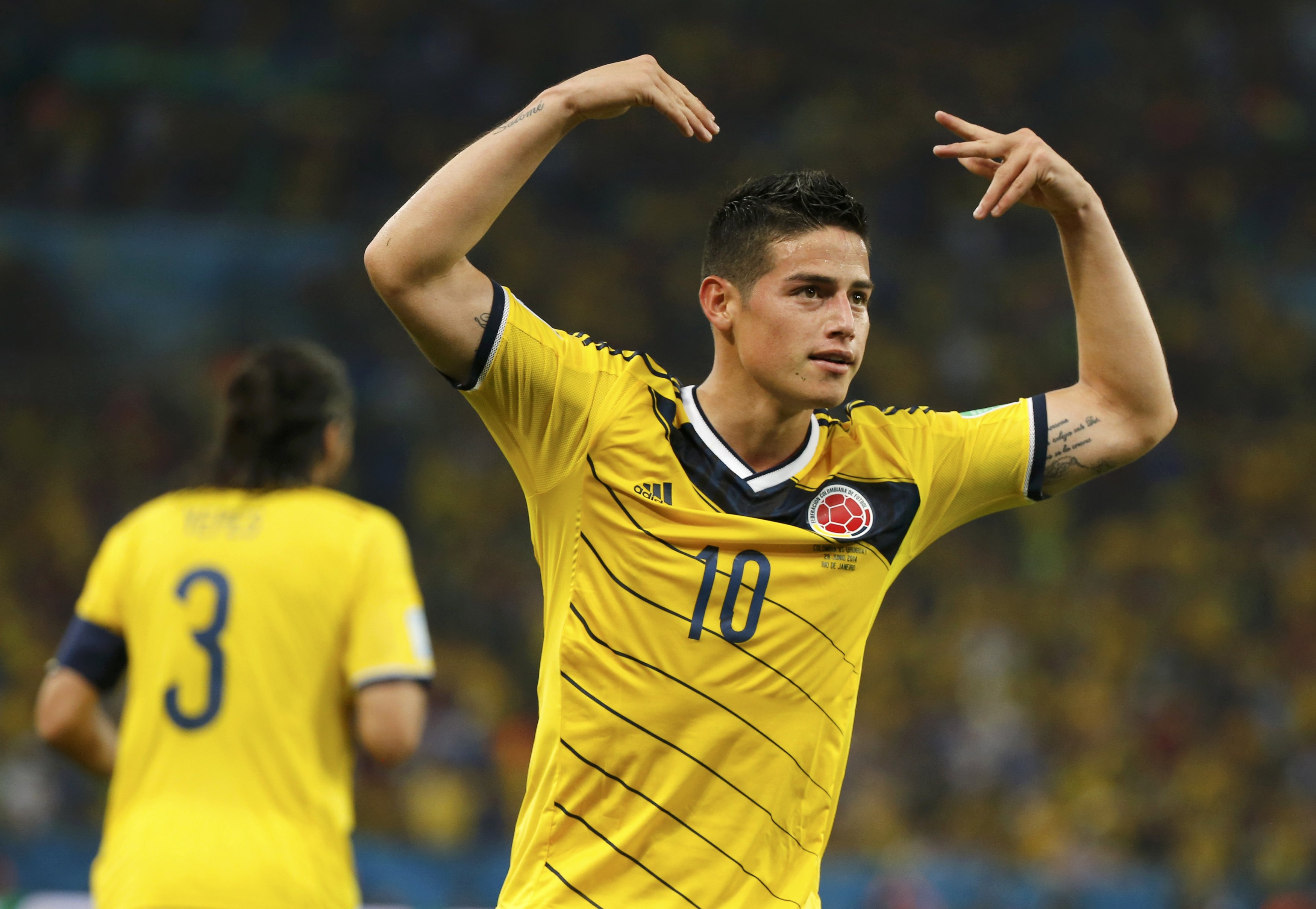 Colombias James Rodriguez celebrates after scoring his second goal 3500x2417