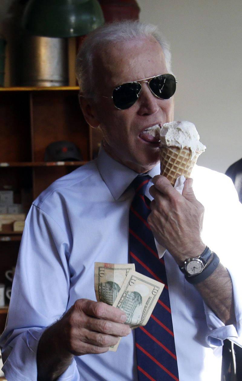 Us President Joe Biden Enjoying An Ice Cream On A Sunny