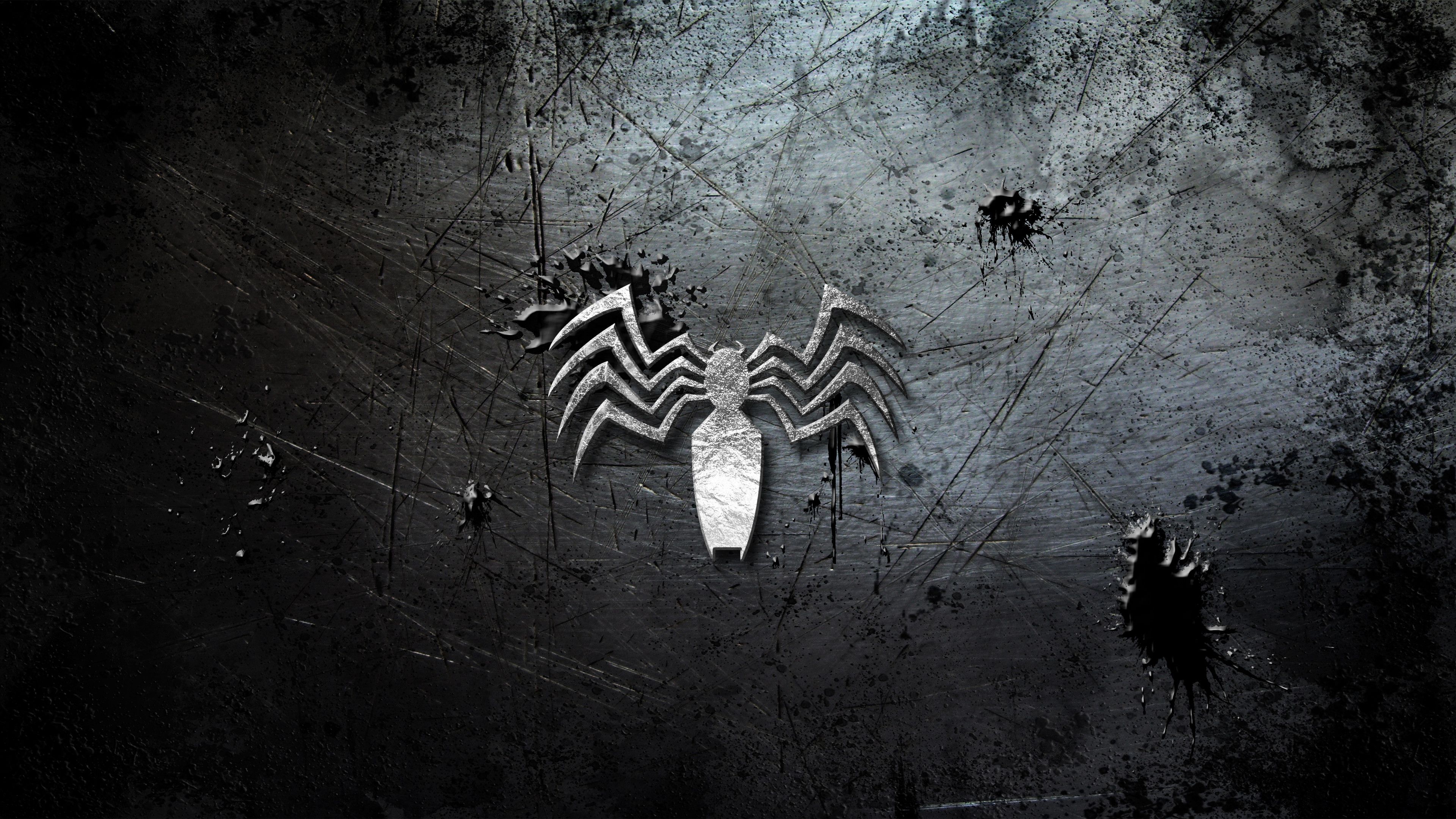 A dark and gritty wallpaper featuring the iconic Venom symbol etched onto a scratched metal surface