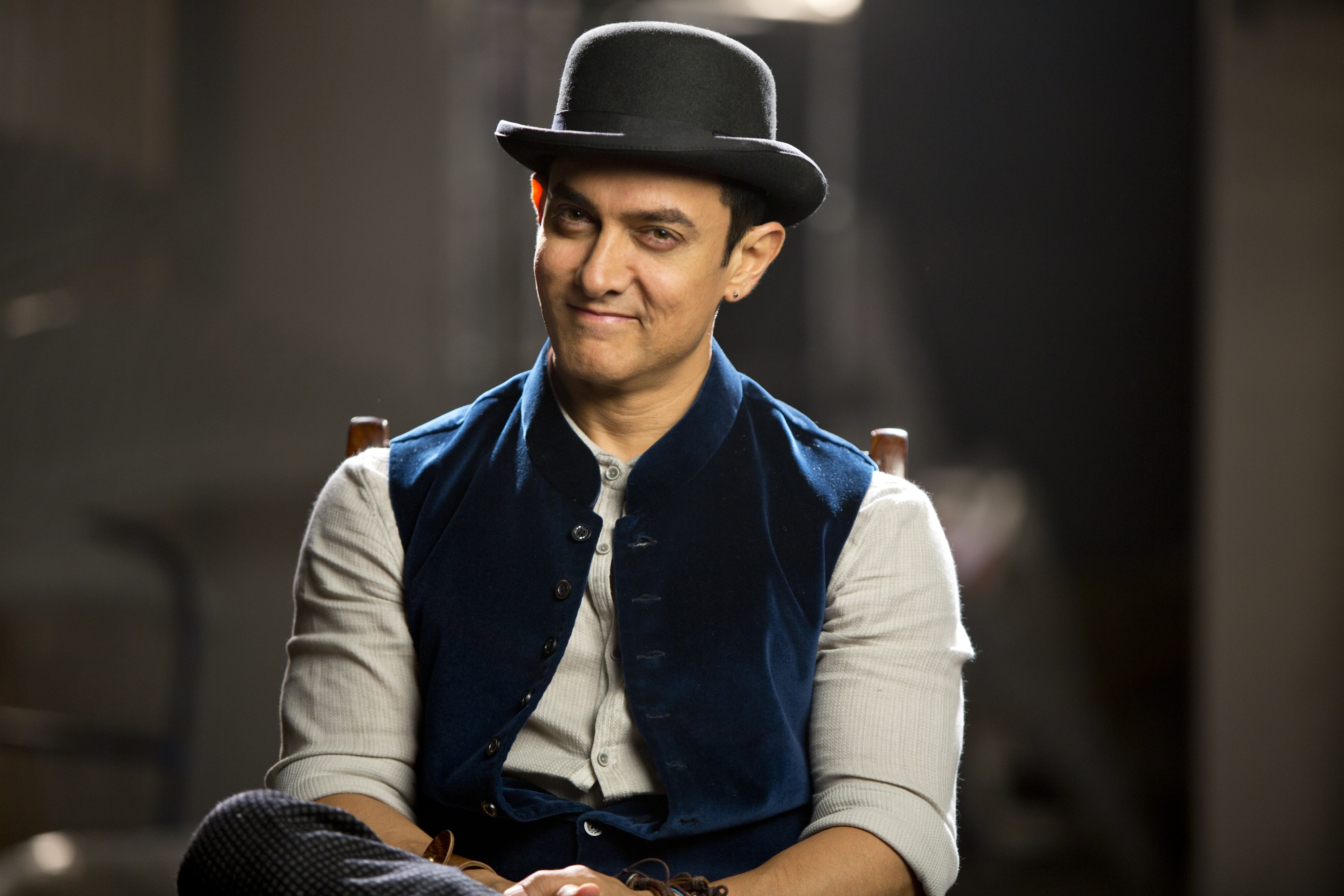 Man Wearing Blue Vest And White Shirt With Black Bowler Hat