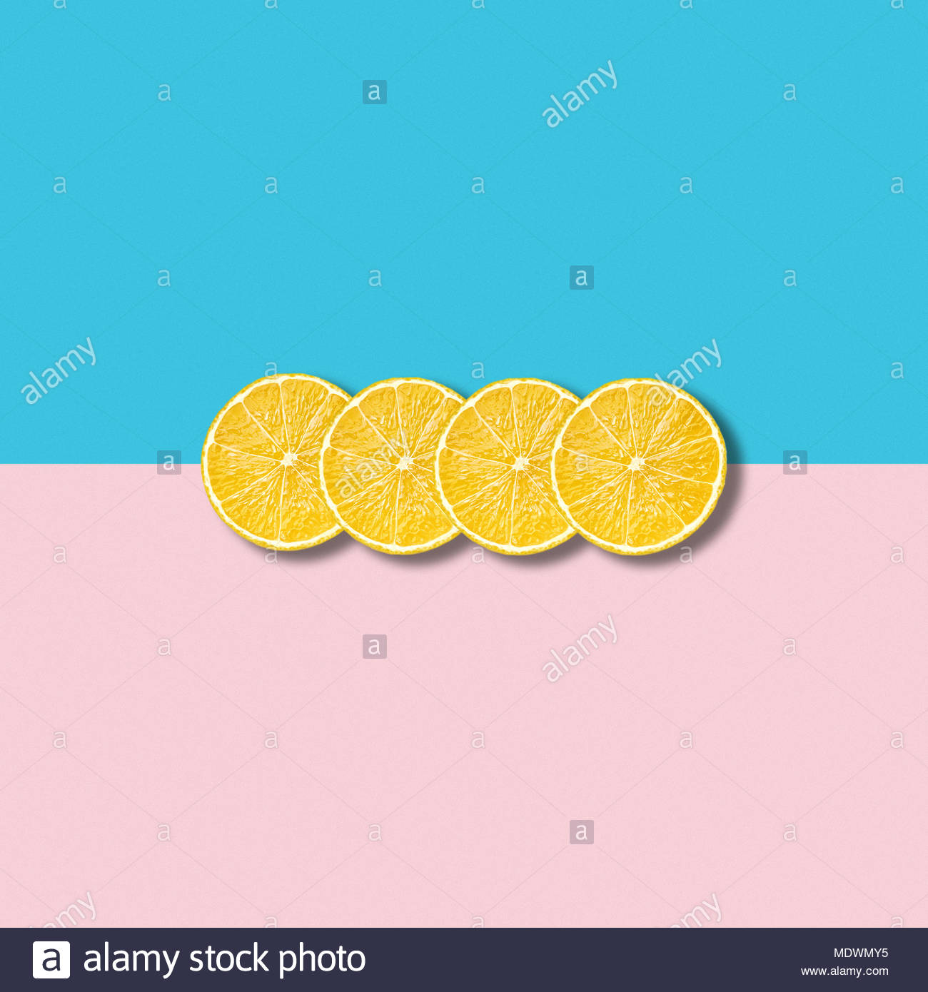 Minimal Abstract Illustration With Group Of Lemon Slices On Pastel