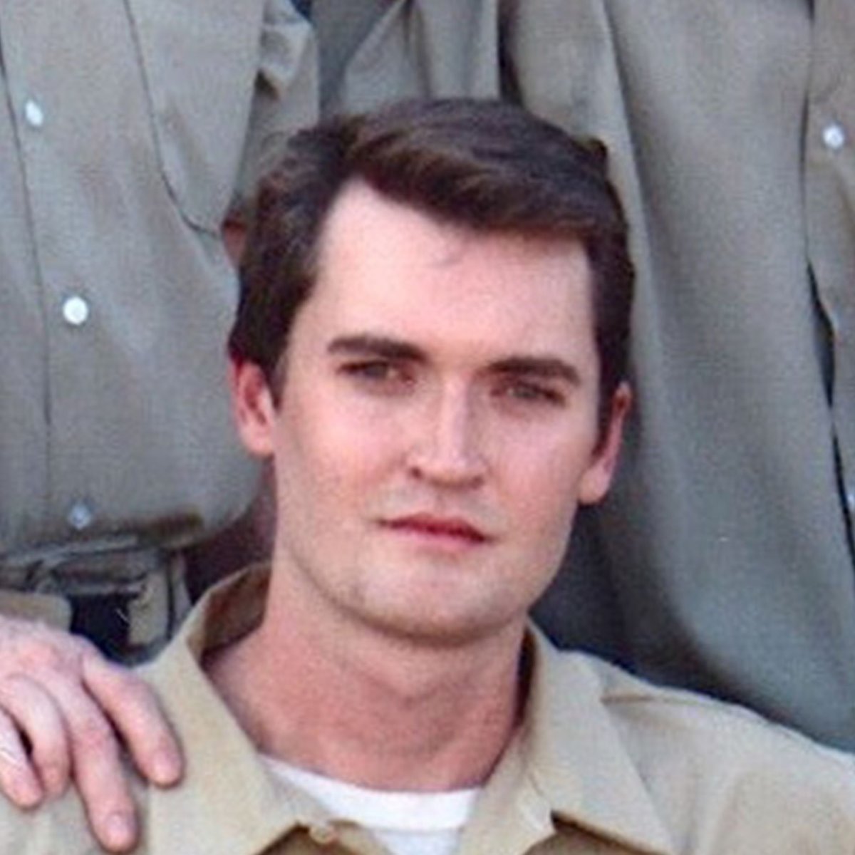 Ross Ulbricht in a tan shirt
