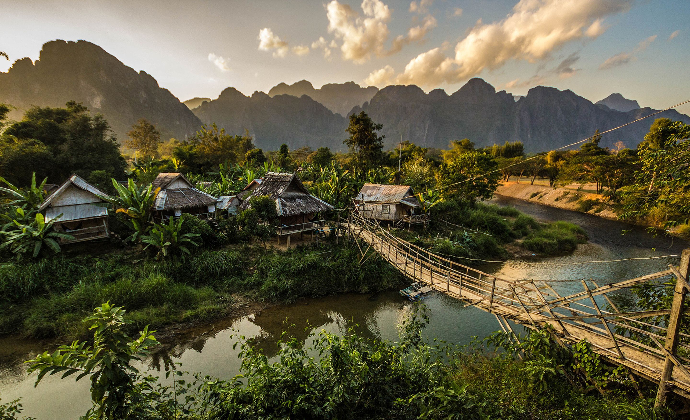 A Small Farming Village In The Jungle Near Vang Vieng Laos Wallpaper