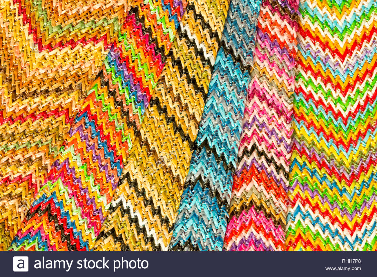 An Abstract Textured Background Design Of Multicolored Zigzag