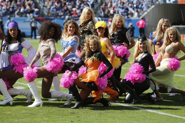 Tennessee Titans Cheerleaders Perform While Wearing Halloween Costumes