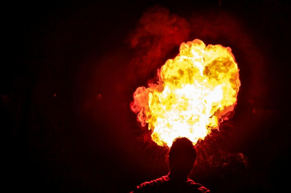 Man Making Fire Photo Image