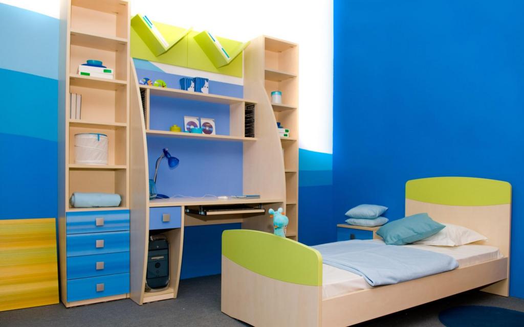 Design With Blue Wooden Study Table And Small Bed On The Gray Floor