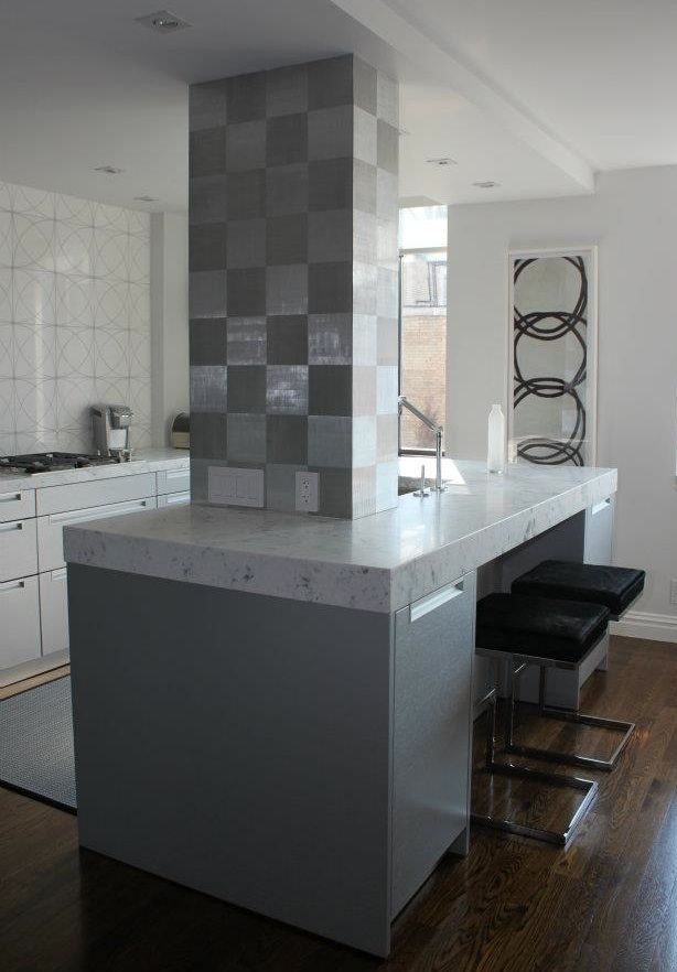Kitchen Column Dressed With Donghia Stainless Steel Wallpaper Tiles