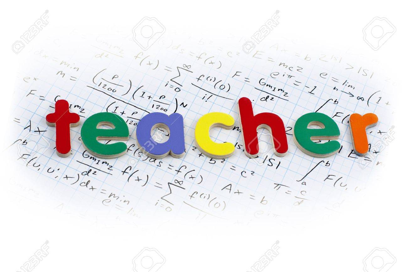 Teacher Written In Colorful Wooden Letters Over A Calculus