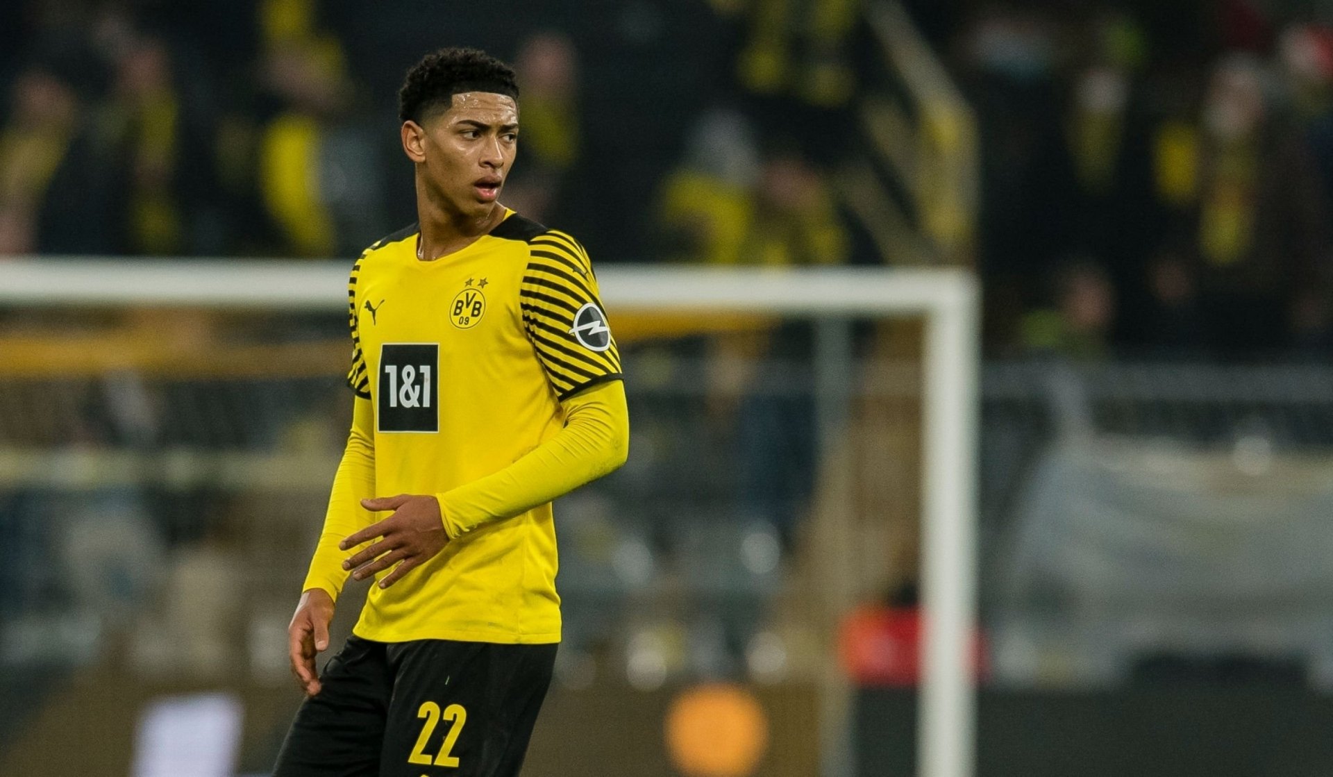 Jude Bellingham in action for Borussia Dortmund, wearing his signature yellow jersey