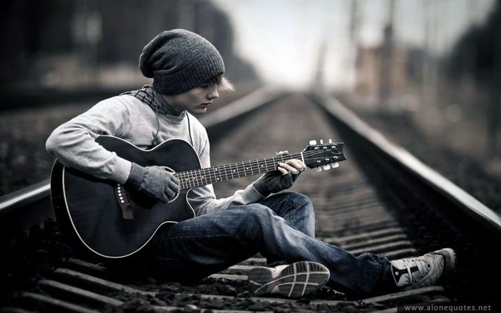 Sad Alone Boy Wallpaper In Rail Way With Guitar