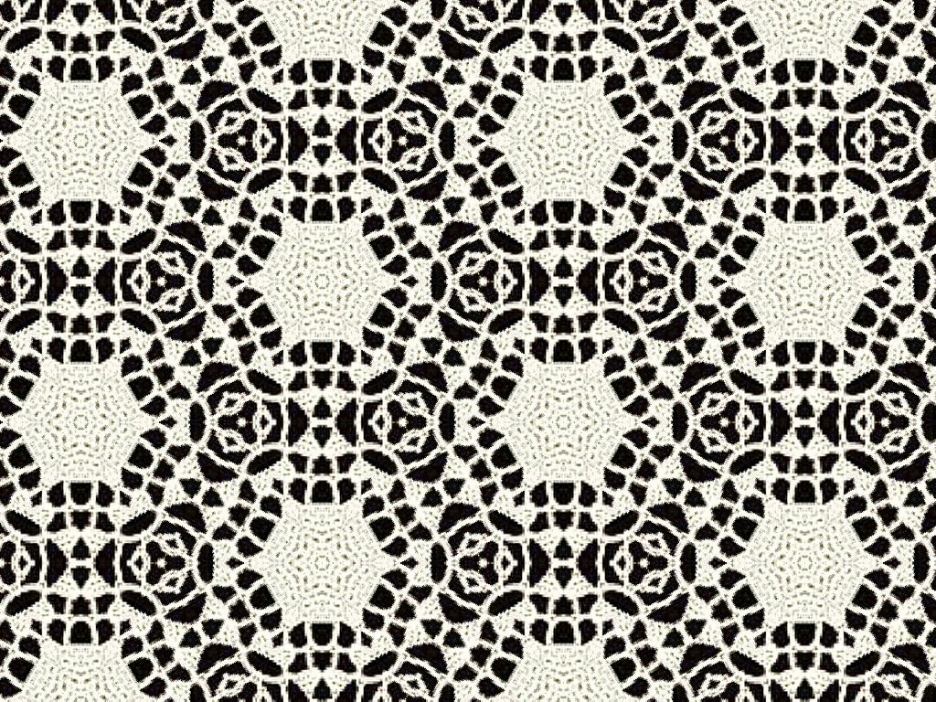 Image Of Lace Cream Wool Over Black Fabric Background