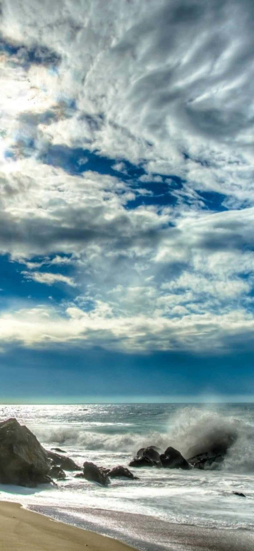 Capture The Golden Sunsets Of Malibu On Your iPhone Xs Wallpaper