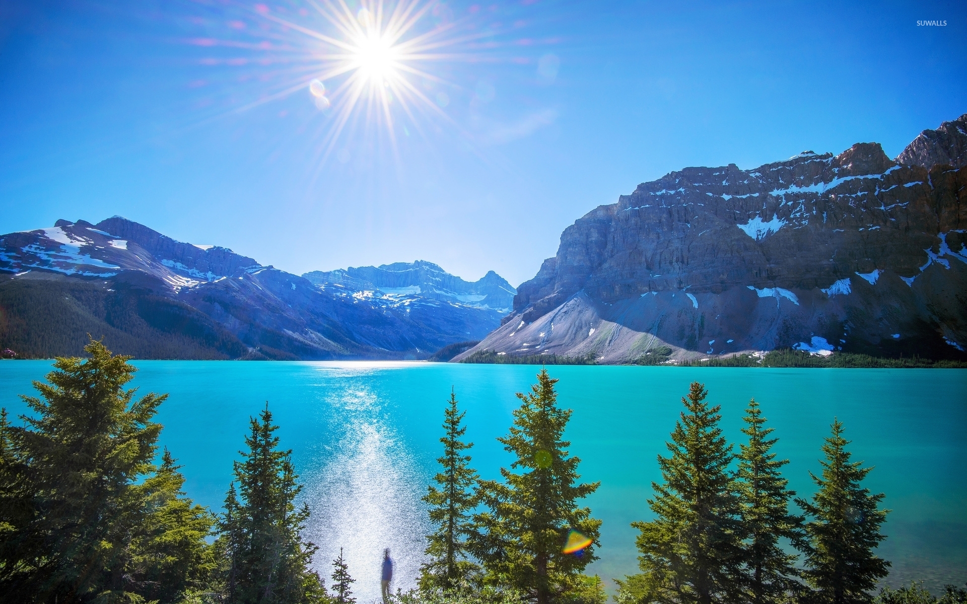 Bright Sun In The Clear Sky Above Mountain Lake Wallpaper