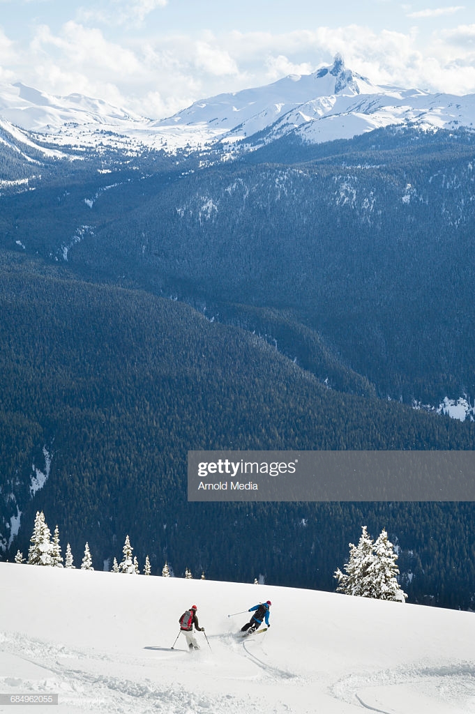 Backcountry Skiers With Black Tusk In Background High Res Stock