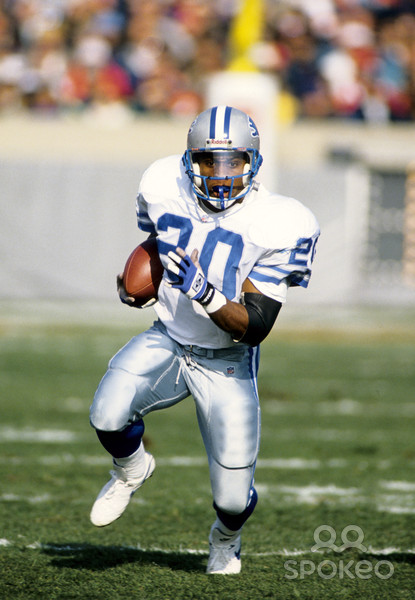 Detroit Lions Running Back Barry Sanders Carries The Ball Against