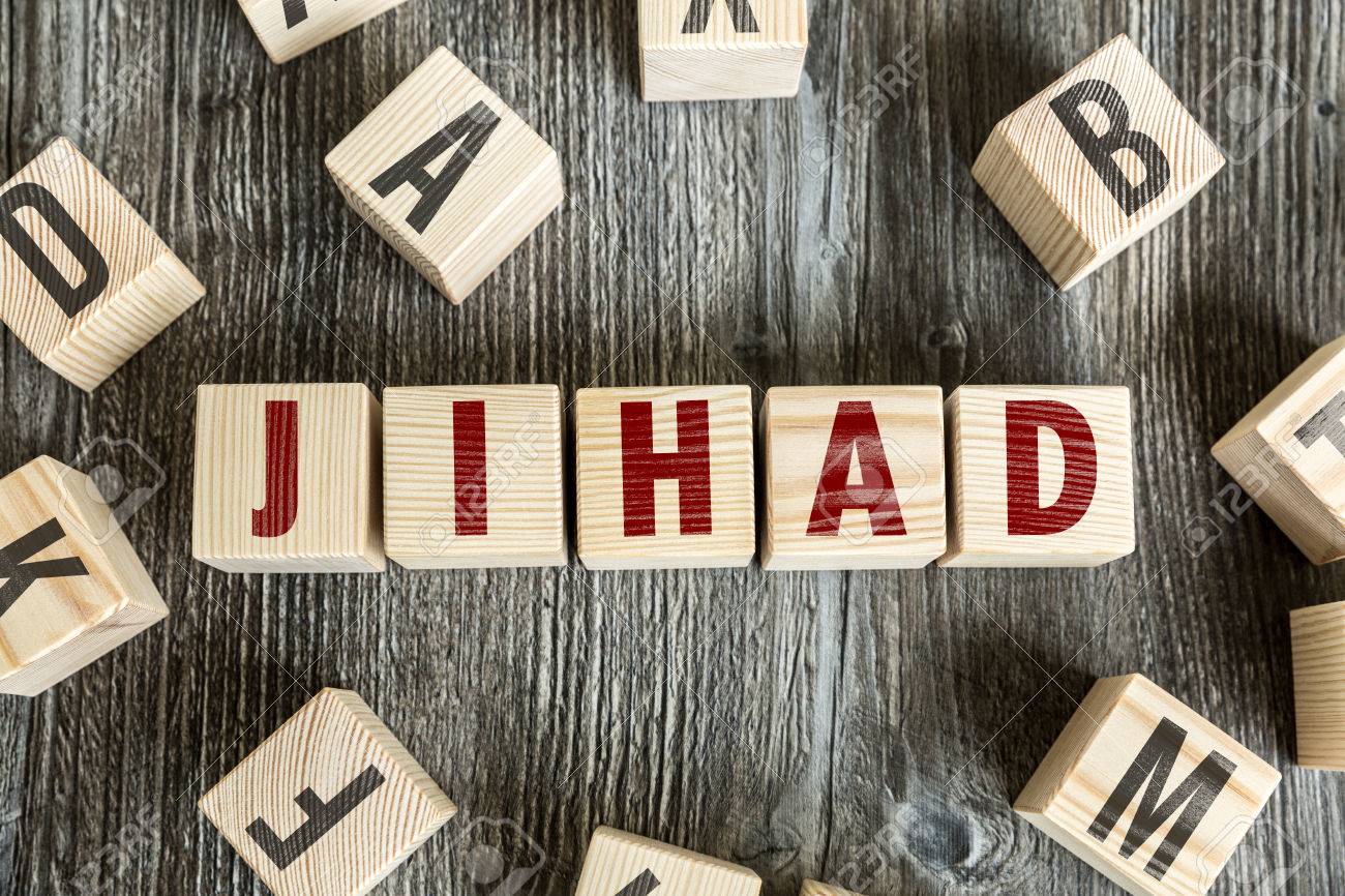 Jihad Written On A Wooden Cube Background Stock Photo Picture And
