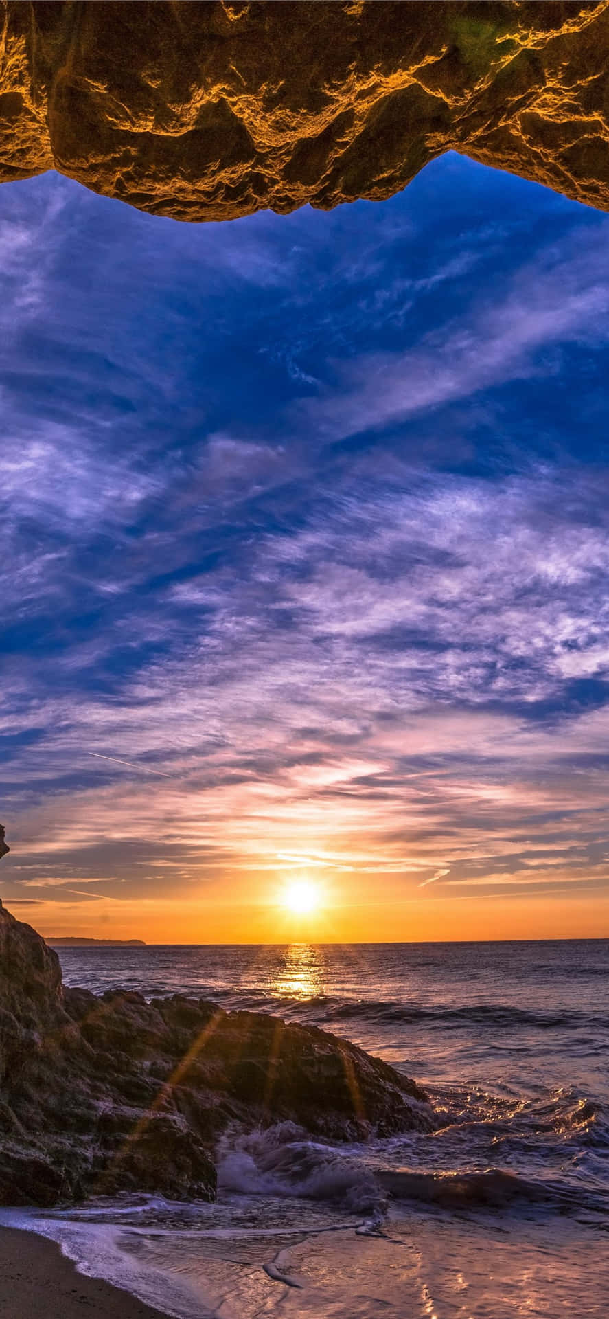 iPhone X Malibu Background Within A Cave Wallpaper