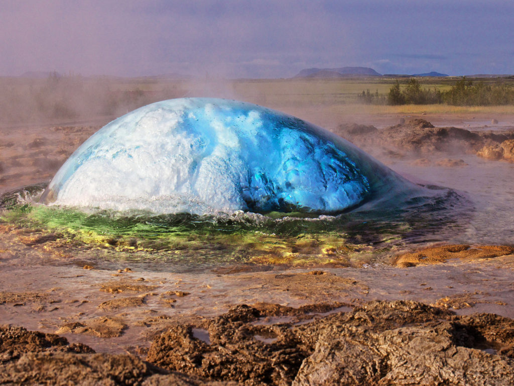 Strokkur Geyser Water Explosion Geothermal Area Along The River