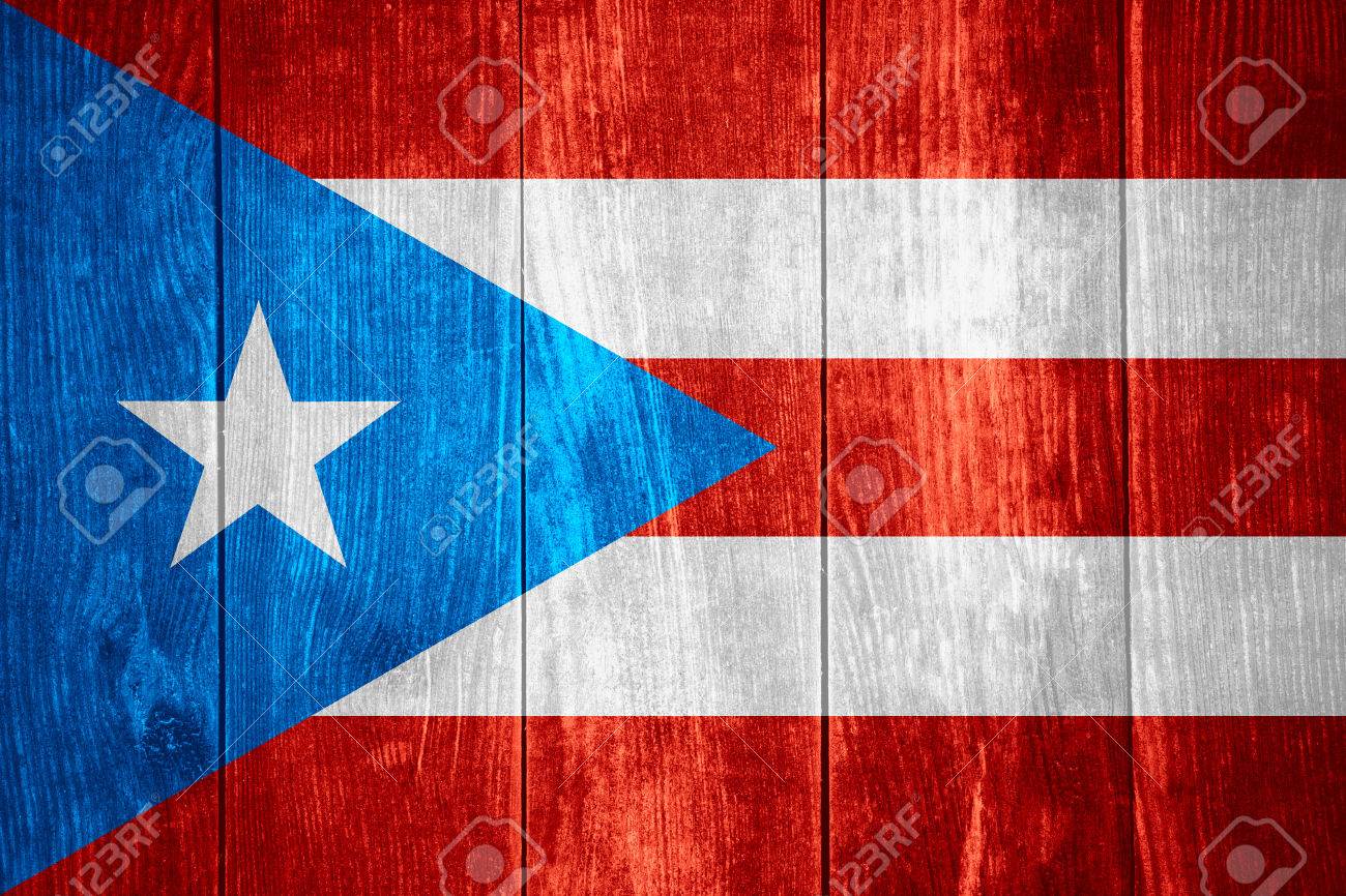 Flag Of Puerto Rico Or Rican Banner On Wooden Background