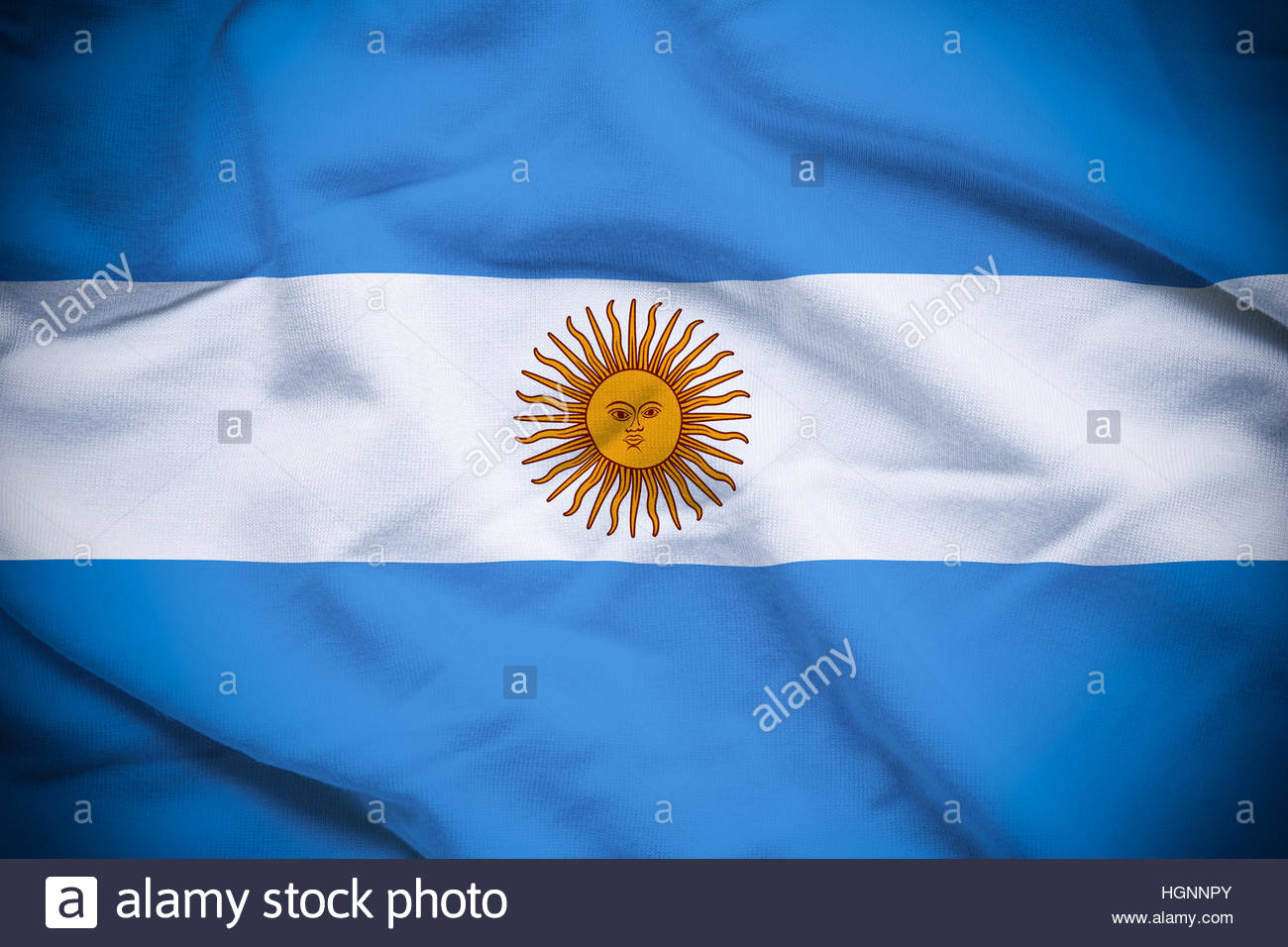 Wavy And Rippled National Flag Of Argentina Background Stock Photo