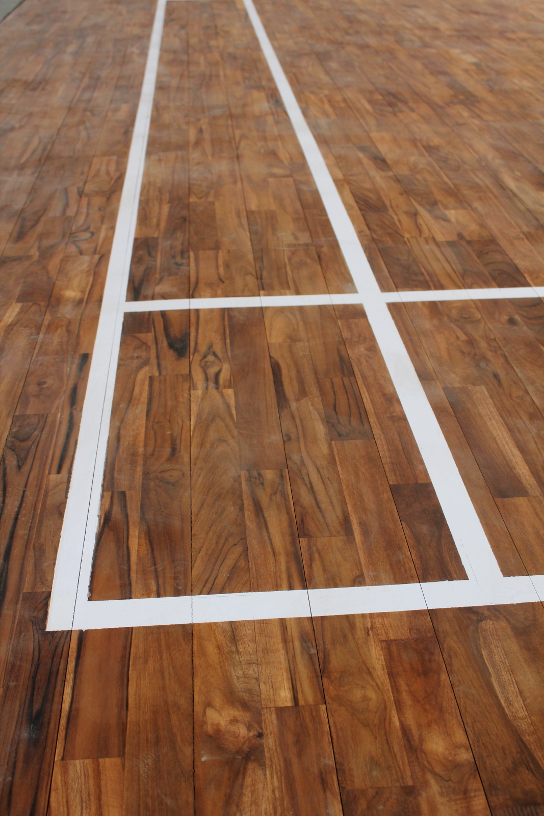 Wooden Badminton Court Surface With White Lines Links
