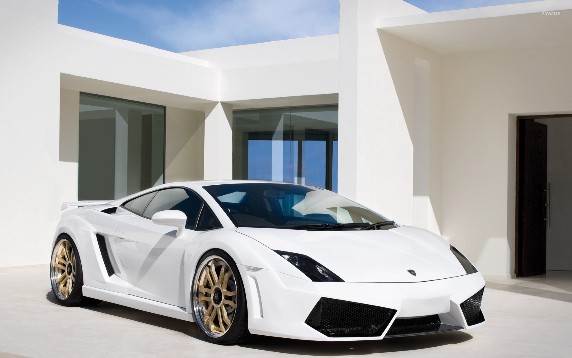 White Lamborghini Gallardo In Front Of A Mansion Wallpaper Car