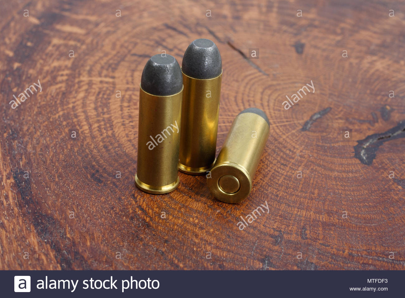 Revolver Cartridges Cal Wild West Period On Wooden Background