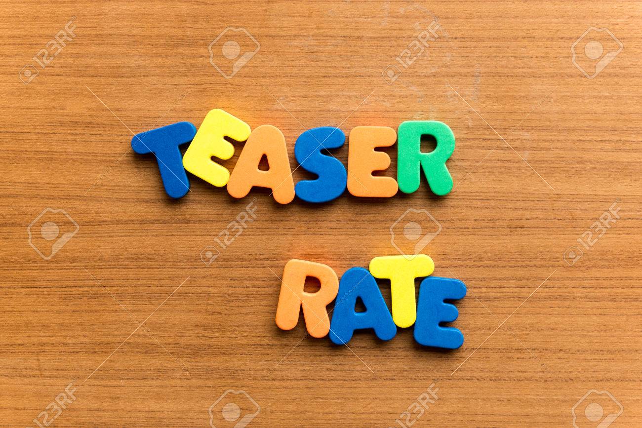 Free download Teaser Rate Colorful Word On The Wooden Background Stock