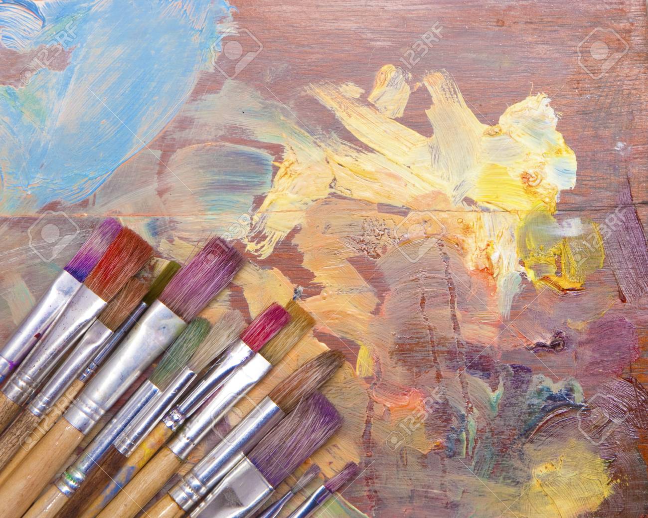 Used Artists Paint Brushes Different Colors On Palette Background