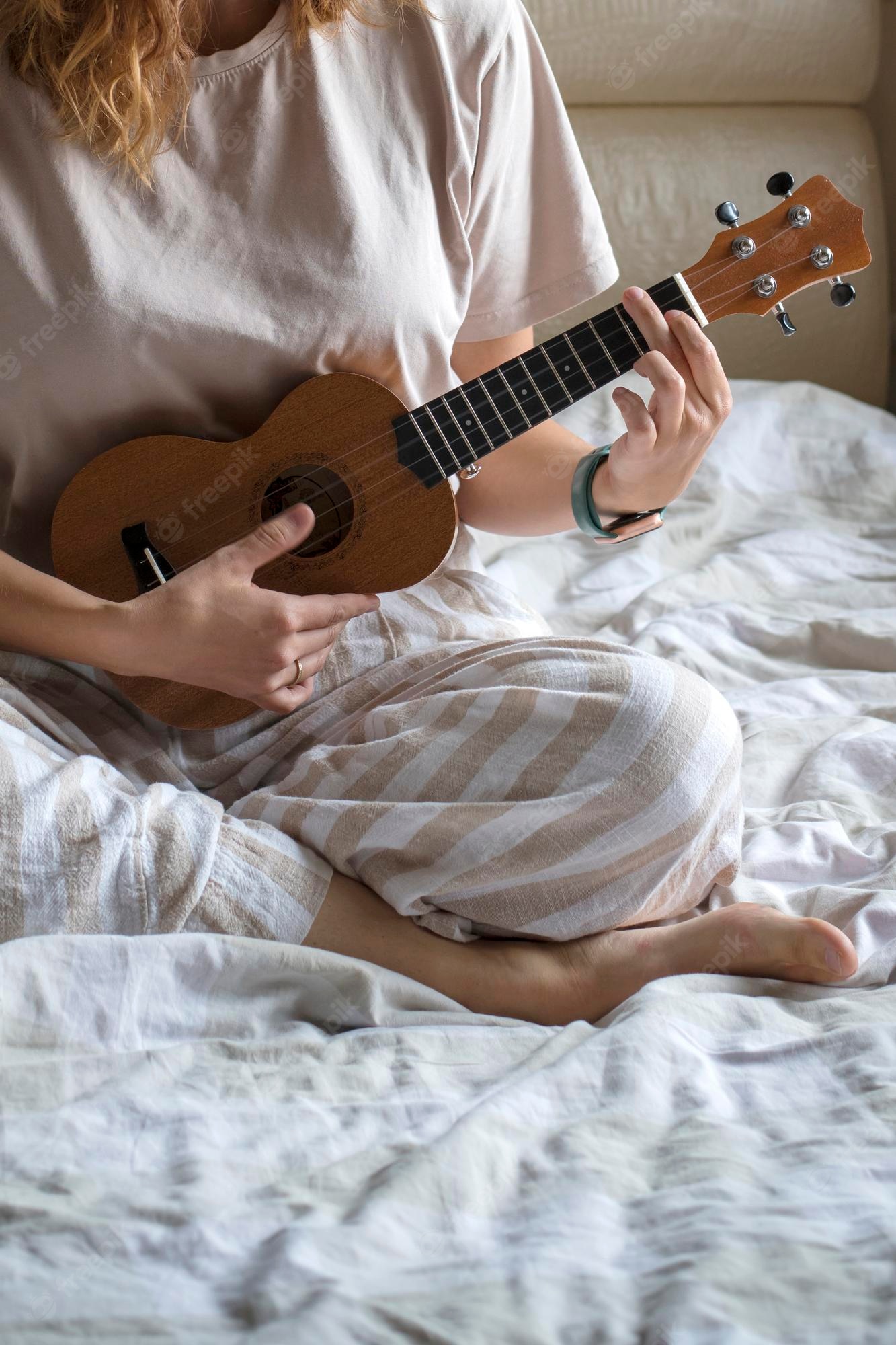 Premium Photo Ukulele In Women S Hands Learning To Play The