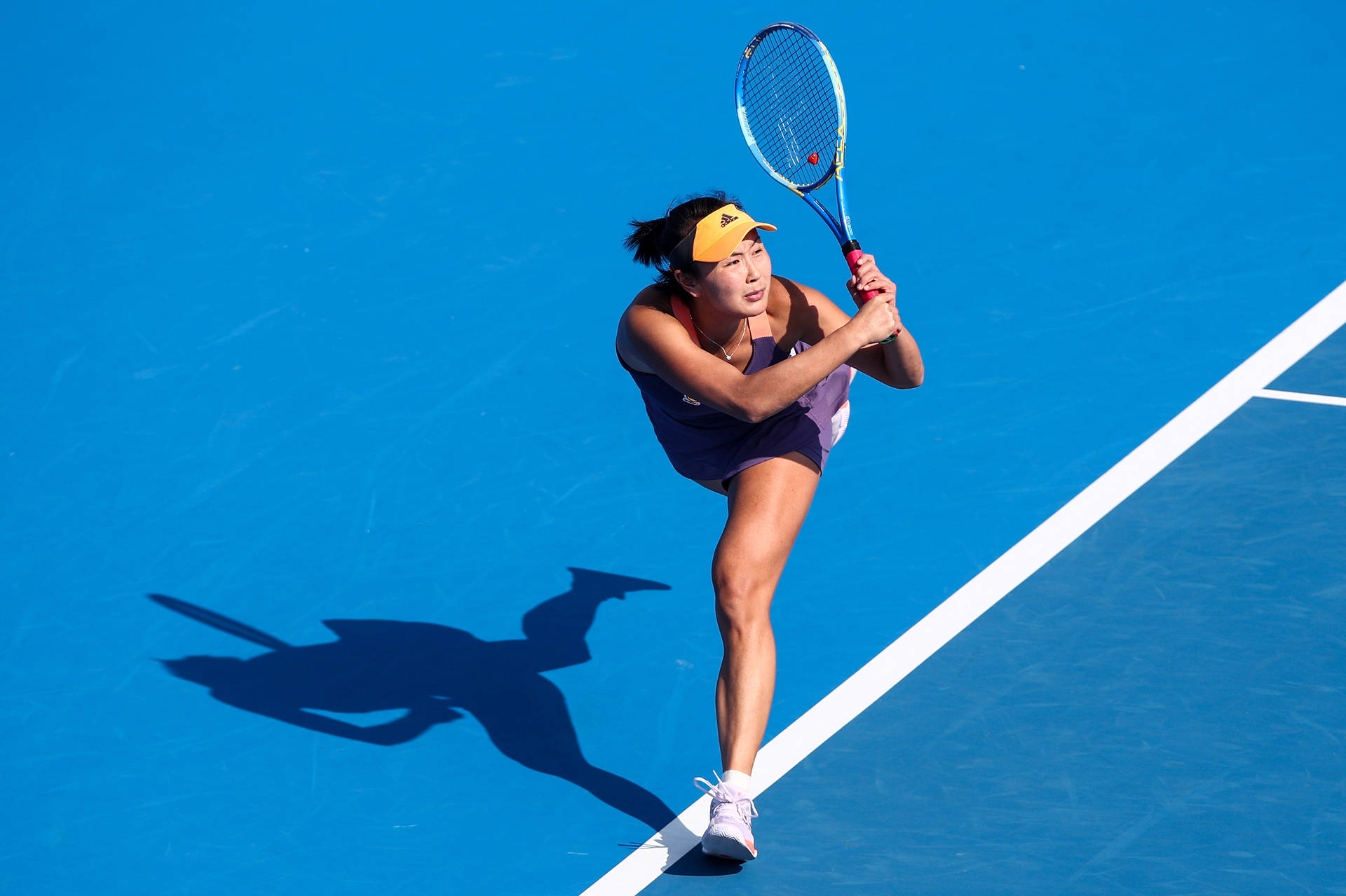 Shuai Peng Tennis Professional In Action Wallpaper