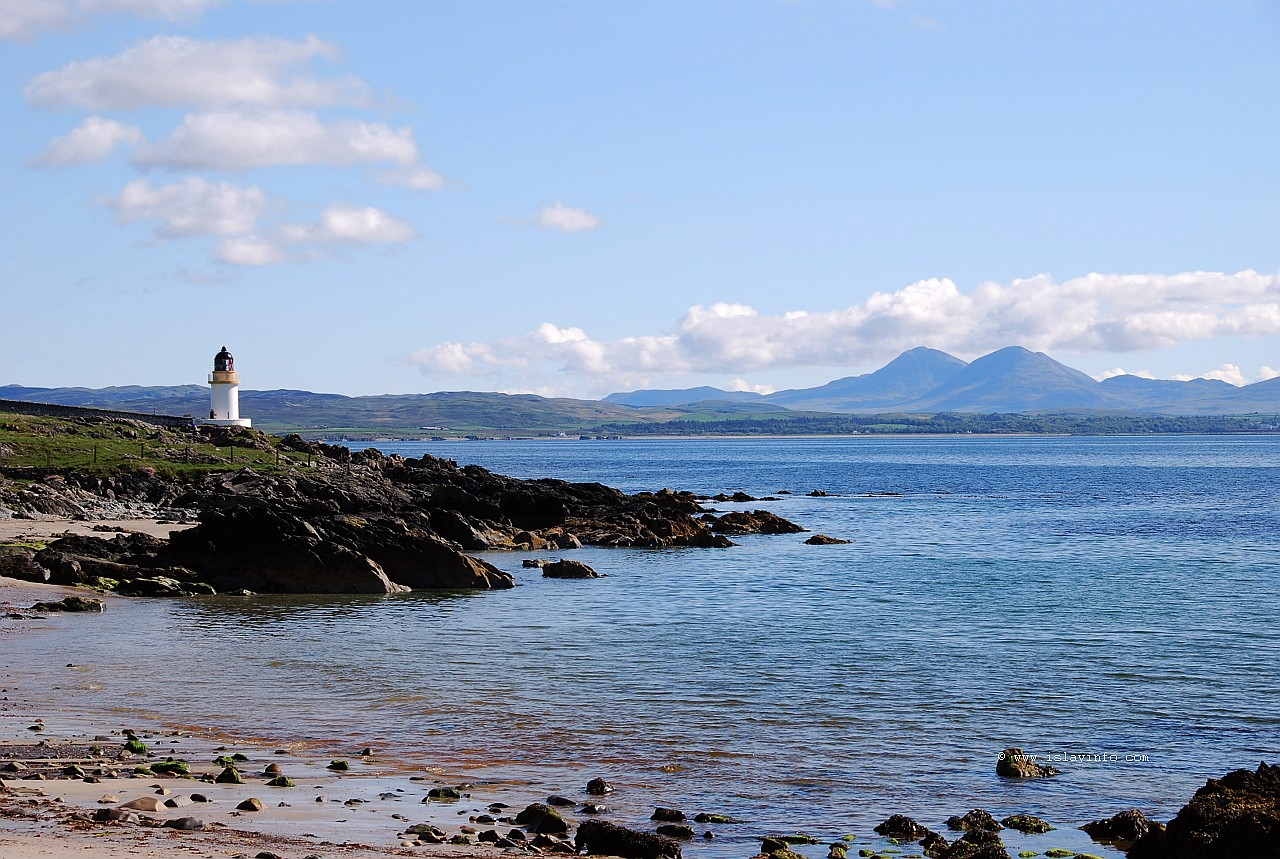 Lochindaal Lighthouse Near Port Charlotte And Paps Of Jura Islay