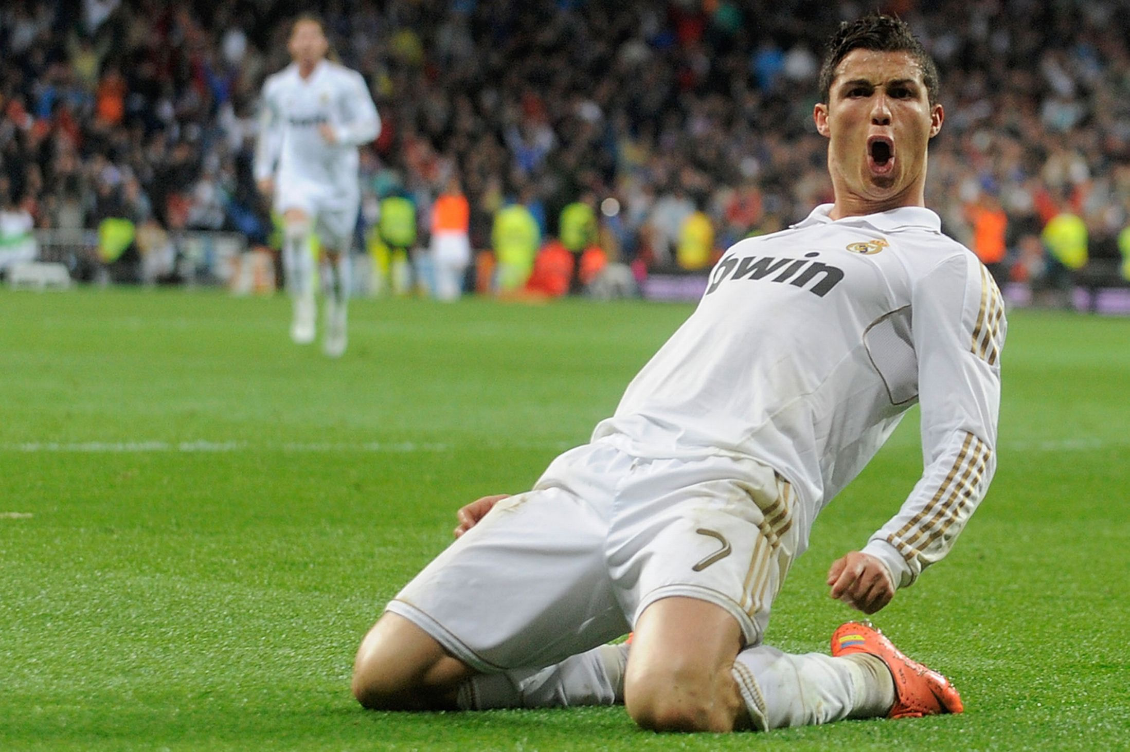Cristiano Ronaldo Celebrating A Goal In White Real Madrid Jersey