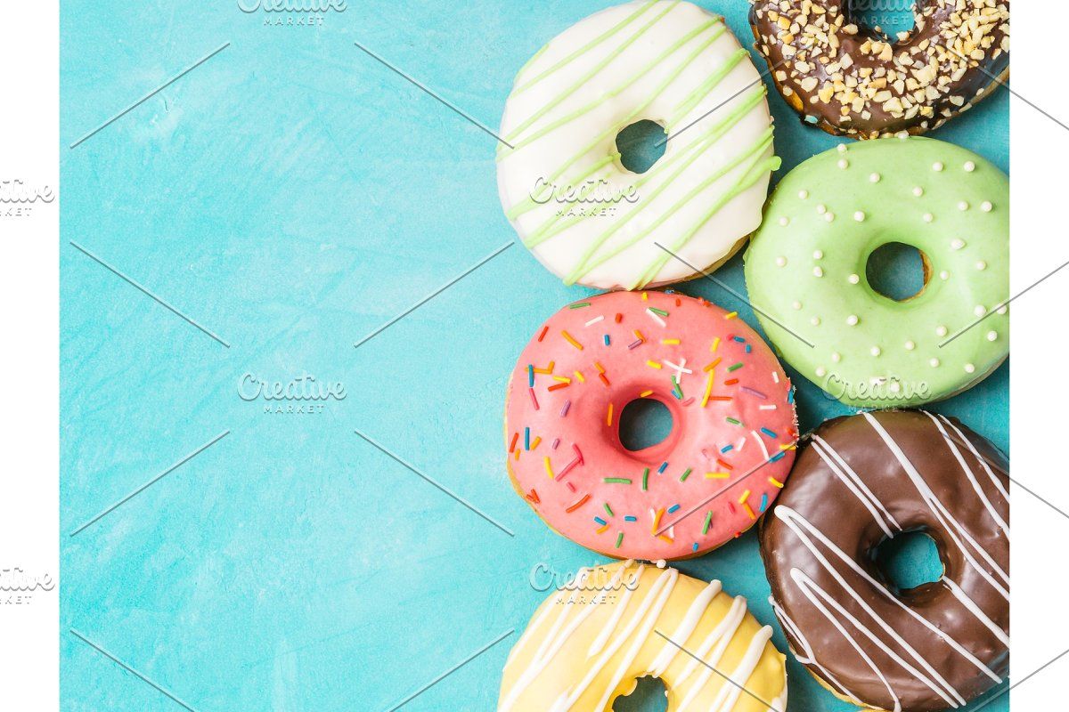 Donuts On Blue Background Copy Space Top Colorful