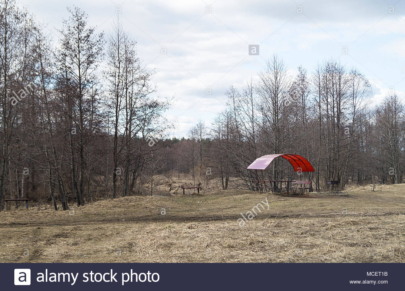 Spring Landscape With Summerhouse Ashore Streams On Background