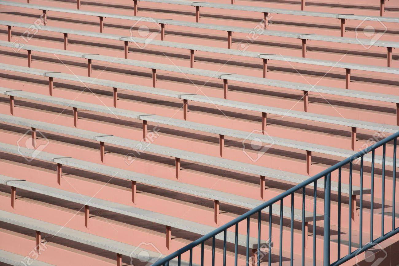Empty Stadium Bleacher Background With Metal Handrail Stock Photo