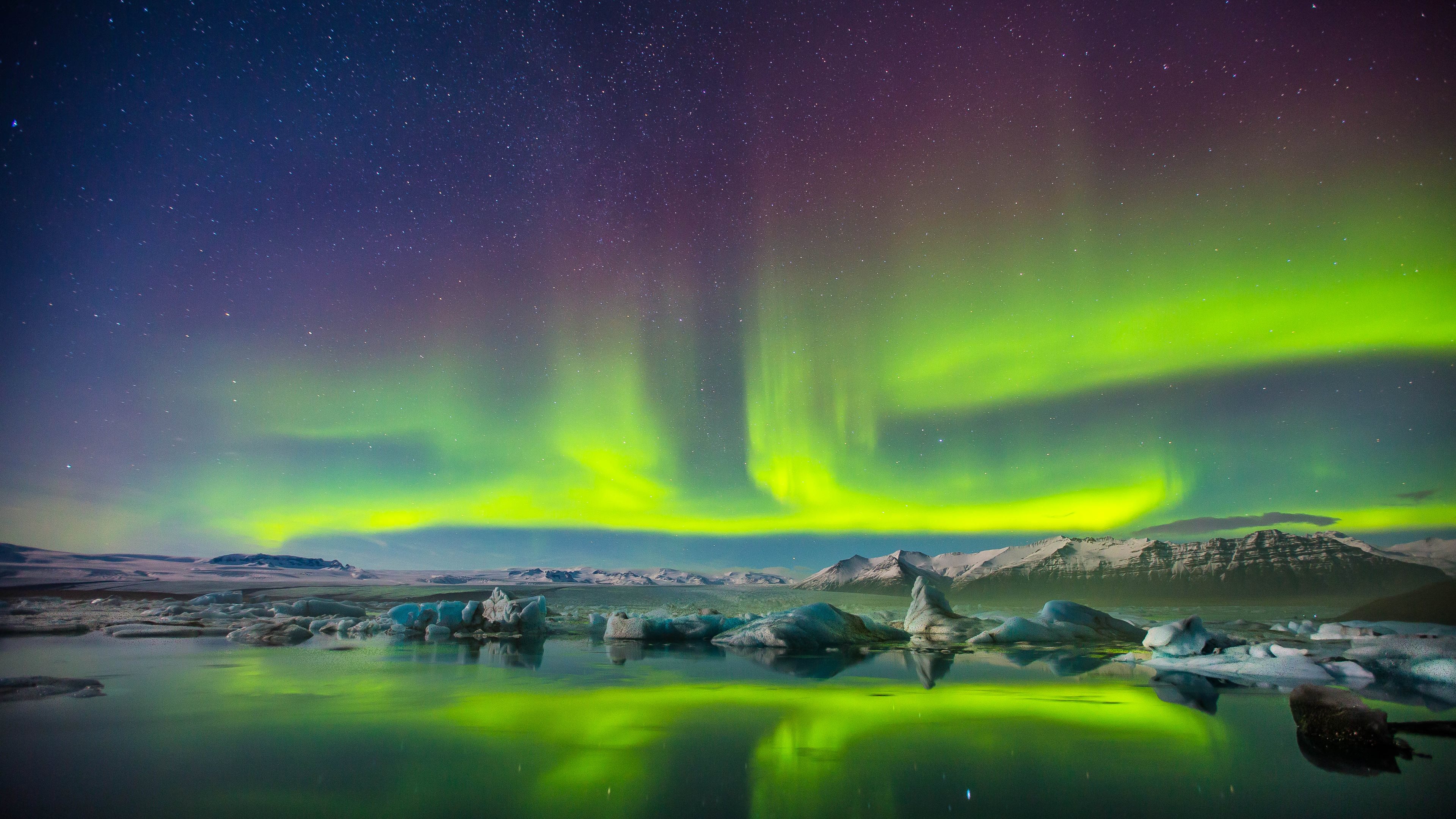 Aurora Borealis over a glacial lagoon in 4K resolution