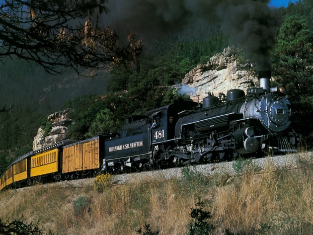 Steam Locomotive In The Mountains