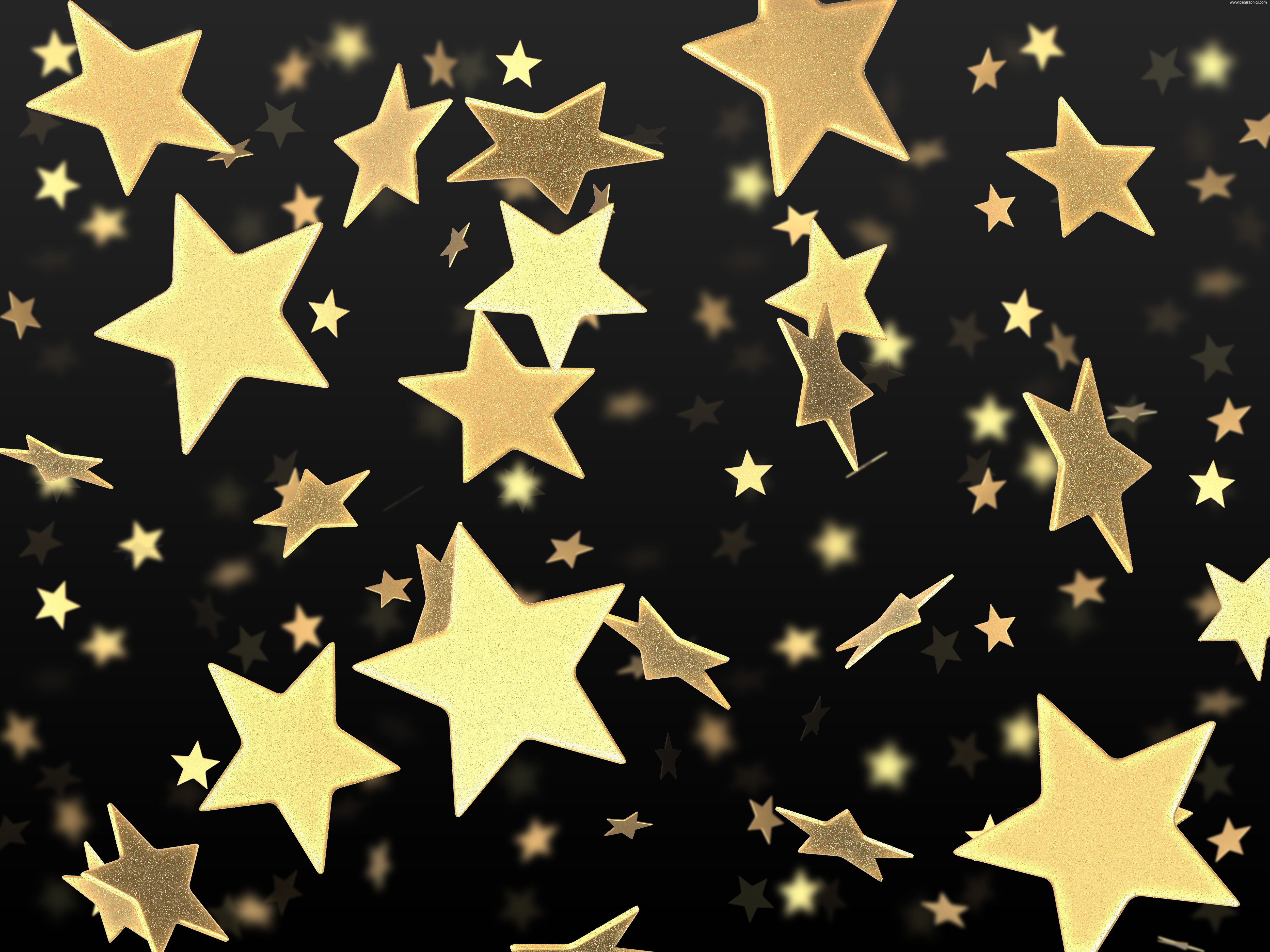 Golden stars on black background PSDGraphics