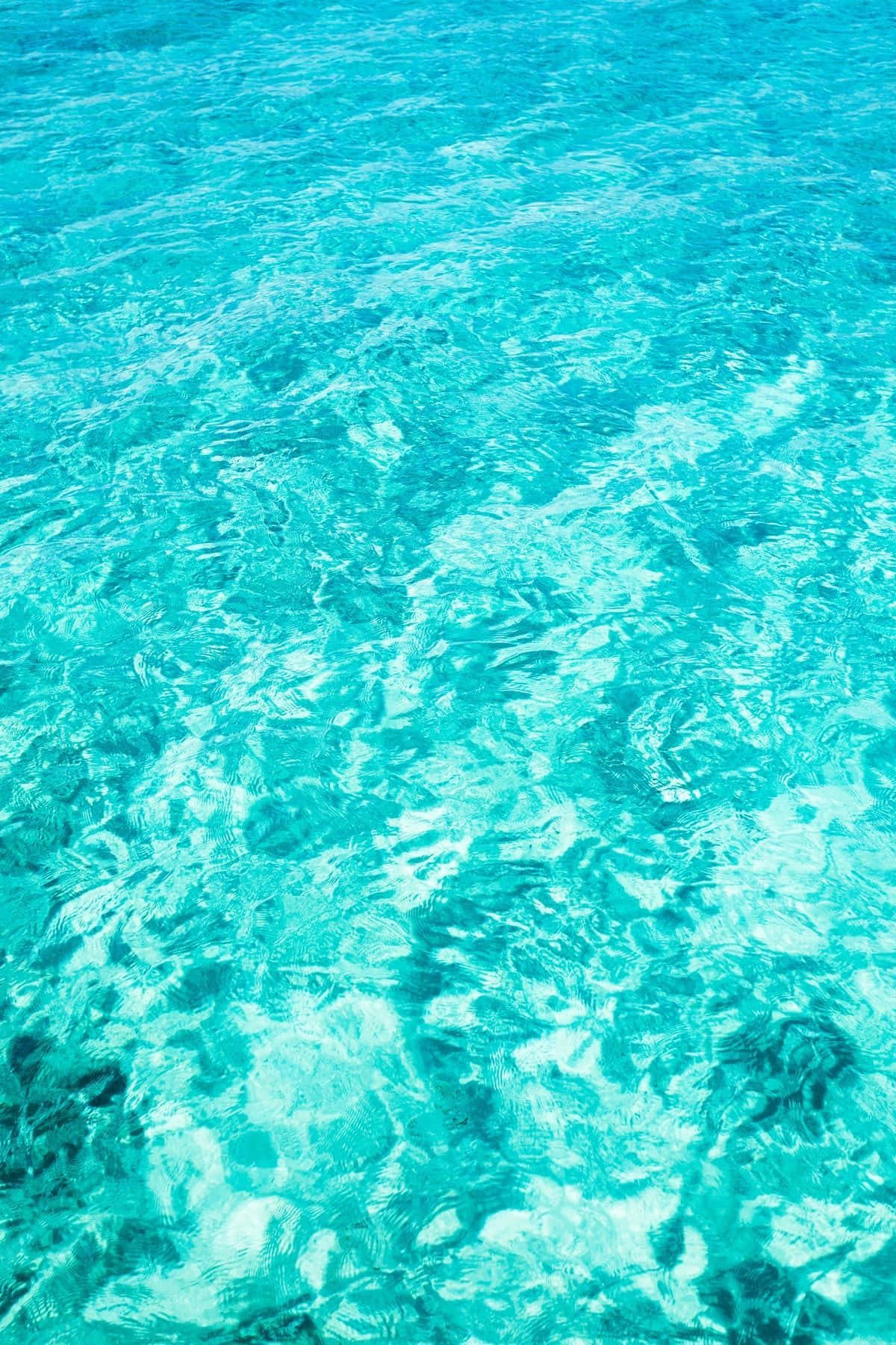 A Captivating Turquoise Aesthetic With Beautiful Sunset Wallpaper