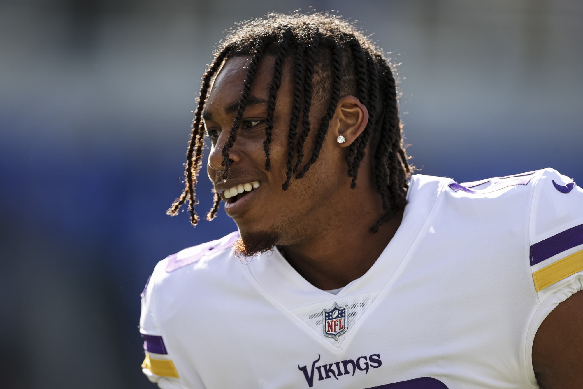 Close-up of Minnesota Vikings wide receiver Justin Jefferson smiling during a game