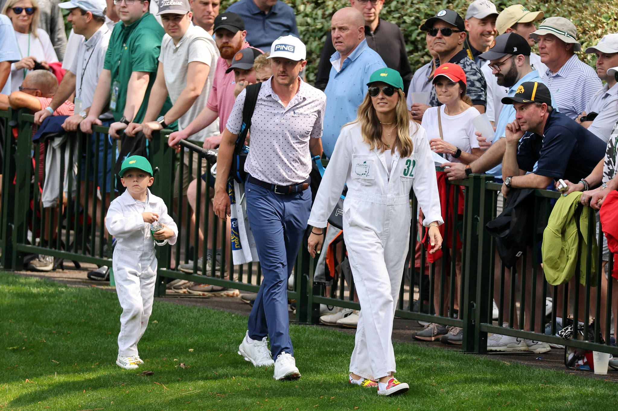 Mackenzie Hughes Walking With Wife Son Wallpaper