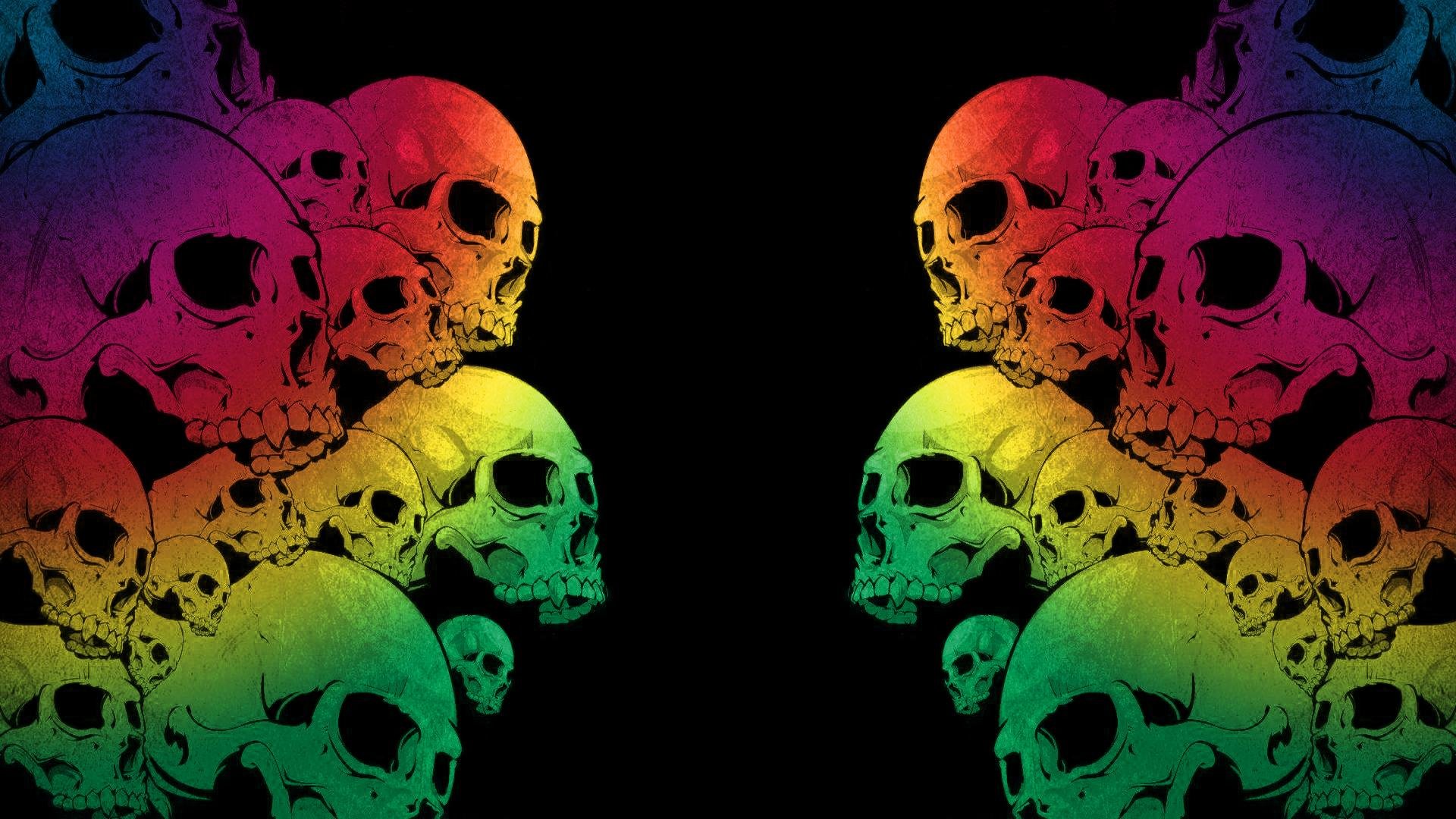 Rainbow Gradient Skulls on Black Background