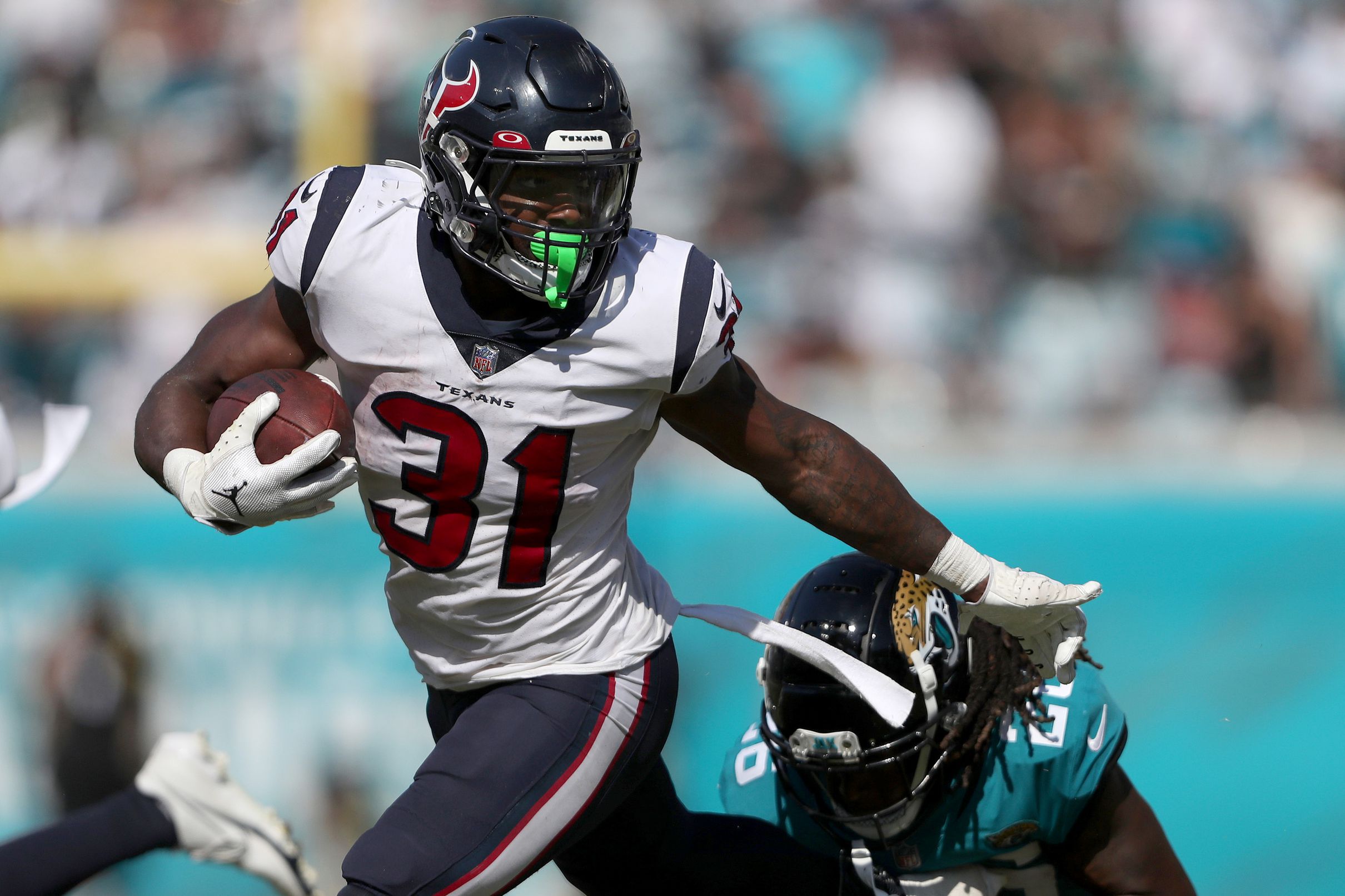 Las Vegas Raiders Stopping Texans Dameon Pierce Wallpaper