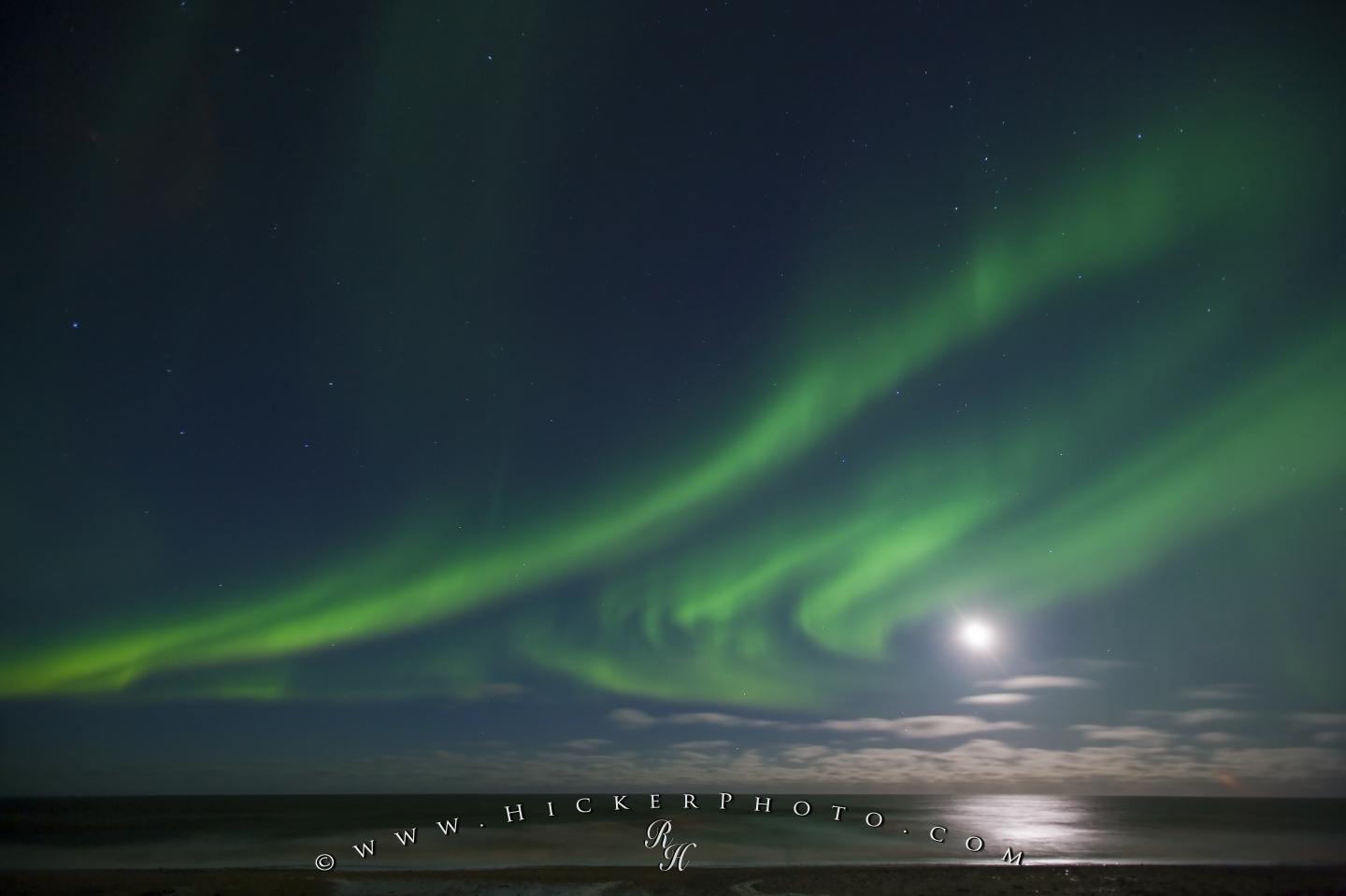 Of Light Over Hudson Bay In Manitoba Canada While The Northern Lights
