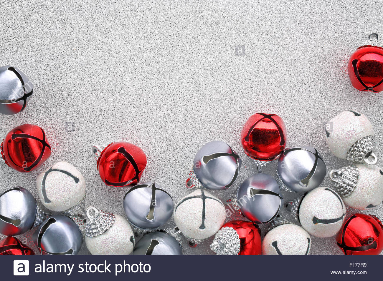 Jingle Bells On Silver Background Stock Photo