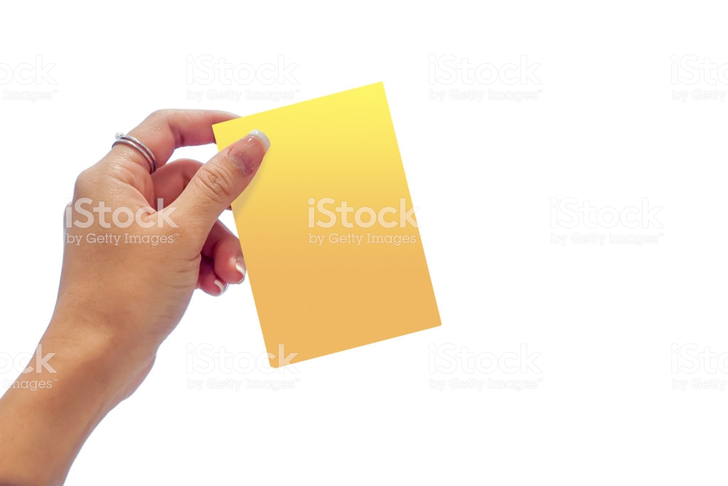 Woman Hand Holding The Yellow Card On White Clear Background Stock