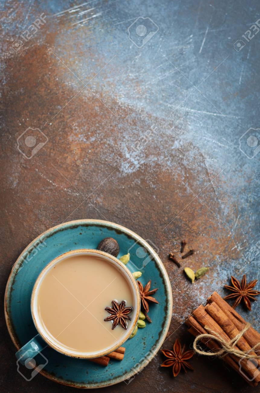 Indian Masala Chai Tea Spicy With Milk On Dark Rusty